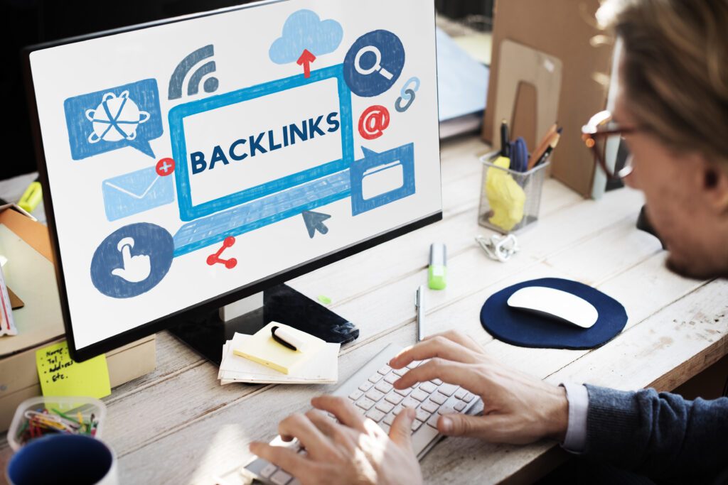 Person researching backlink building strategies for SEO on a computer screen.