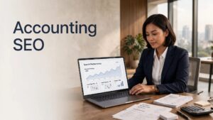 Malaysian accountant reviewing SEO analytics beside tax papers and a calculator.