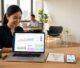 Laptop with privacy settings, a lead funnel sketch, cookie icon, and enquiry form phone.