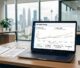 Laptop dashboard compares Control and Variant SEO results beside printed page cards.